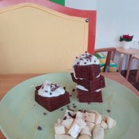 Choco-Banana Cake with coconut frosting! at To Bazaki Juice Bar in Chalandri