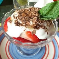 Chocolate cake with cream and strawberries  at Arvore do Mundo in Porto