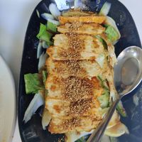 Homemade tempeh with cucumber salad at Ama Vegan Kitchen in Chiang Mai