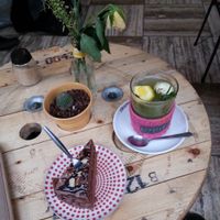 homemade lemon-rosemary hot tea and chocolate cake at KAFETHEA in Maastricht