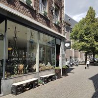 front, benches on one side (terrace around the corner) at KAFETHEA in Maastricht