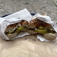 A savoury bagel from Bury Me Standing, with a custom mix of toppings. at Bury Me Standing  in Hobart