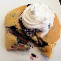 Pancakes with fresh blueberry and jam . at Tweny Leaf in Lisbon