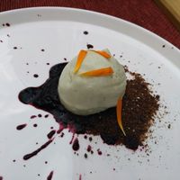 christmas tree spruce tip ice with raw blueberry jam and dark bread with chocolate crumble at Aed Restaurant in Tallinn