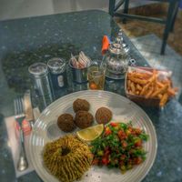 Delicious falafel, humous & salad with fries and herb tea at Cafe Clock in Marrakech