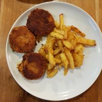 Vegan buckwheat patties with fries at VegeQuchnia in Opole
