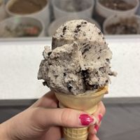 Single scoop of their cookies and cream ice cream on a cake cone  at Hug Life in Garden Grove