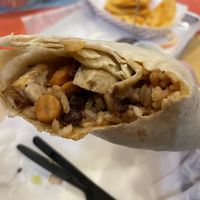 Tofu and grilled veggie burrito no cheese no lettuce subbed black beans. Much smaller than burritos used to be    at Chubby's Tacos in Durham