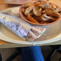 Beet falafel wrap and potato wedges  at Chickpeas in Ottawa