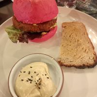 Happy vegan Burger with hummus and toast instead of fries. at Scheckter's Raw in Cape Town