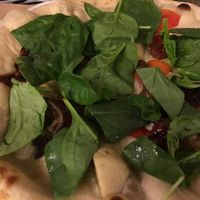 Pizza with artichoke and spinach at Vegan Express in South West London