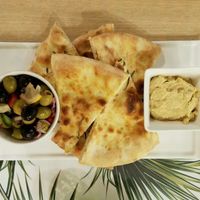 toast with hummus and olives at Vegan Express in South West London