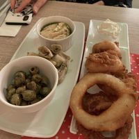 Humous, flatbread & olives / onion rings and mayo at Vegan Express in South West London