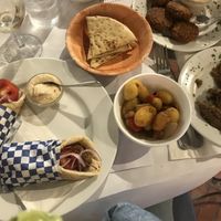 Falafel gyro, papas de la casa y babaghanoush  at Del Griego in Guatemala City