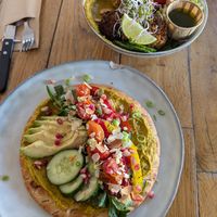 Hummus and bread, salad bowl with falafel and quinoa at ROOS Taste and Smile in Leiden