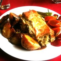 Sunday Roast, cheesy leek and mushroom parcel with Carrot, mangtout and roat potato. at Vegan Food Pimp in Brighton