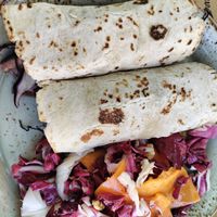 Tacos con tofu, guacamole, cavolo viola e melograno serviti con insalatina di zucca, radicchio e noci at La Mi Mama in Rimini