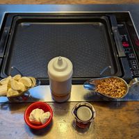 vegan and gluten-free pancake batter, pecans, maple syrup, vegan butter, and bananas at Slappy Cakes in Portland