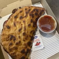 Made my own calzone - pepperoni, mushrooms, onions  at Razzi's Pizzeria - Howell St in Seattle