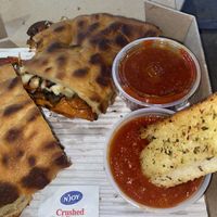 Breadsticks and calzone  at Razzi's Pizzeria - Howell St in Seattle