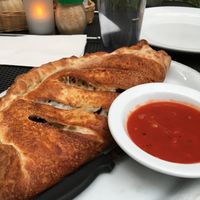 Build-your-own calzone. Easily serves two people.  at Razzi's Pizzeria - Howell St in Seattle