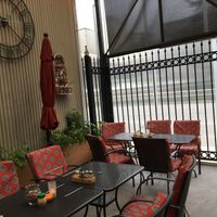 Indoor/outdoor eating space. Heated.  at Razzi's Pizzeria - Howell St in Seattle