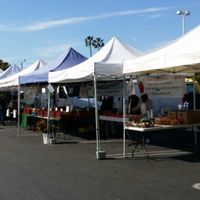 Another Row if Vendors at Farmer's Market - Midtown in Ventura