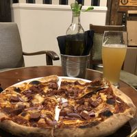 Vegan BBQ pizza with alcohol free beer  at Graciarnia in Wroclaw