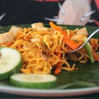 Mie goreng, which is fried noodles. Ask them vegetarian and with no egg and no krupuk (crackers, that are made of flour and shrimps).  at Bale Sampan in 