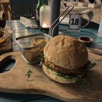 Veggie burger and fries (half eaten).  Requested no cheese to hopefully make it vegan...  at Bale Sampan in 
