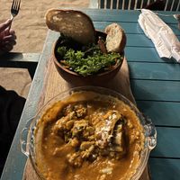 Lasagne (slightly eaten already when pic taken). Includes a really nice side salad and garlic bread. Includes cheese so veggie, not vegan    at Bale Sampan in 