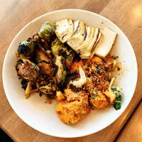 Tofu with Yuzu Brussels and Red Chile Glazed Sweet Potatoes  at Flower Child - The Domain in Austin