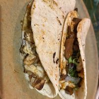 Quesadilla de tofu en salsa verde y de birria  at La Flaca - Americana in Guadalajara
