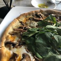 Amici pizza with vegan cheese at Veggitalia in Puerto Vallarta