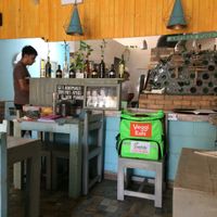 kitchen and cute waiter at Veggitalia in Puerto Vallarta
