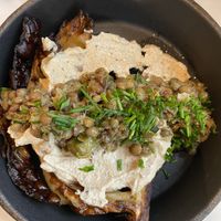 Grilled cabbage with tahini and lentils  at Plants by Deliciously Ella in London