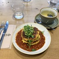 Corn fritters with smoky baked beans and avo smash  at Plants by Deliciously Ella in London
