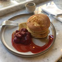 Vanilla pancakes with roasted strawberries and maple syrup   at Plants by Deliciously Ella in London