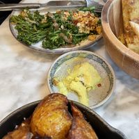 Homemade butter and charred broccoli truffle vinaigrette, macadamia parmesan, chili  at Plants by Deliciously Ella in London