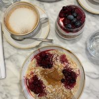 Creamy almond butter par Porridge + Coconut yoghurt topped with delicious Ella granola parfait + Almond cappuccino   at Plants by Deliciously Ella in London