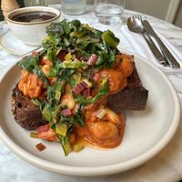 harissa and garlic butterbeans with garlic & chili sautéed rainbow chard on pan-fried garlicky sourdough  at Plants by Deliciously Ella in London