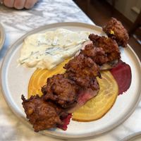 Sweet corn fritters with pickled beetroot   at Plants by Deliciously Ella in London