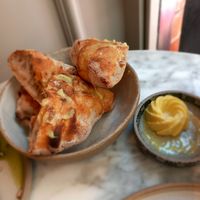 Bread with cashew butter at Plants by Deliciously Ella in London