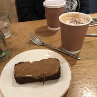 Banana bread and oat cappuccino  at Plants by Deliciously Ella in London