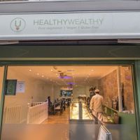 From outside the Restaurant shines with a Golden light and the food fragrance pervades the Street! at HealthyWealthy in North London