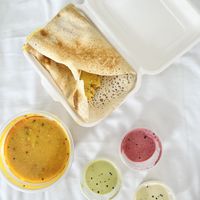 Masala dosa with chutneys (you get two dosas!)  at HealthyWealthy in North London