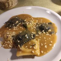 Black and white ravioli with funghi and seitan filling and cashew sauce at La Tecia Vegana in Venice