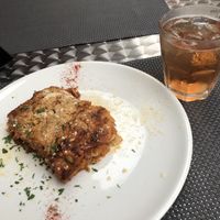 The delicious lasagna with a Spritz  at La Tecia Vegana in Venice