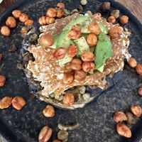 Esta tostada estaba muy sencilla y muy cara (volcán de elote) $92 pesos. Nada del otro mundo.   at Paraíso Vegano in Mexico City