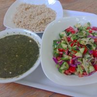 Molokhia and rice with baladi salad at Osana Wholefood Restaurant in Cairo